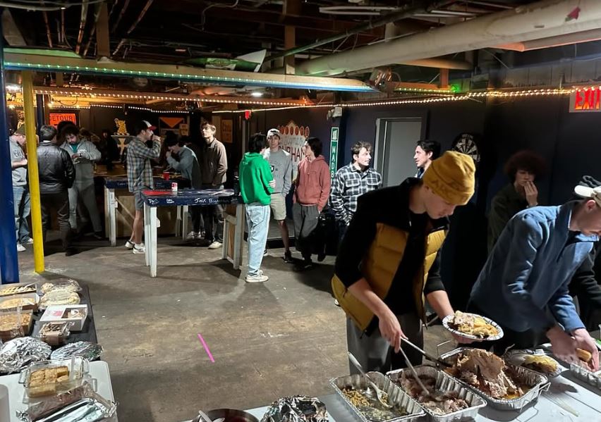 Brothers gathered in the basement for Fratsgiving
