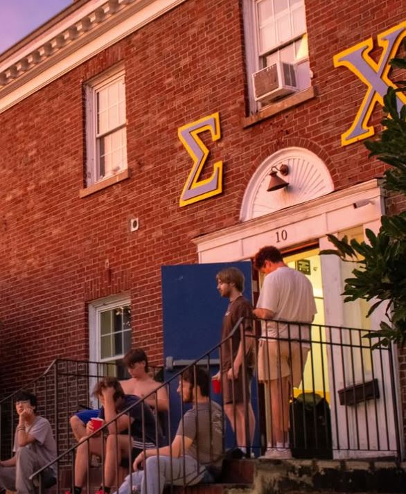 Brothers hanging out on the front steps in the summer